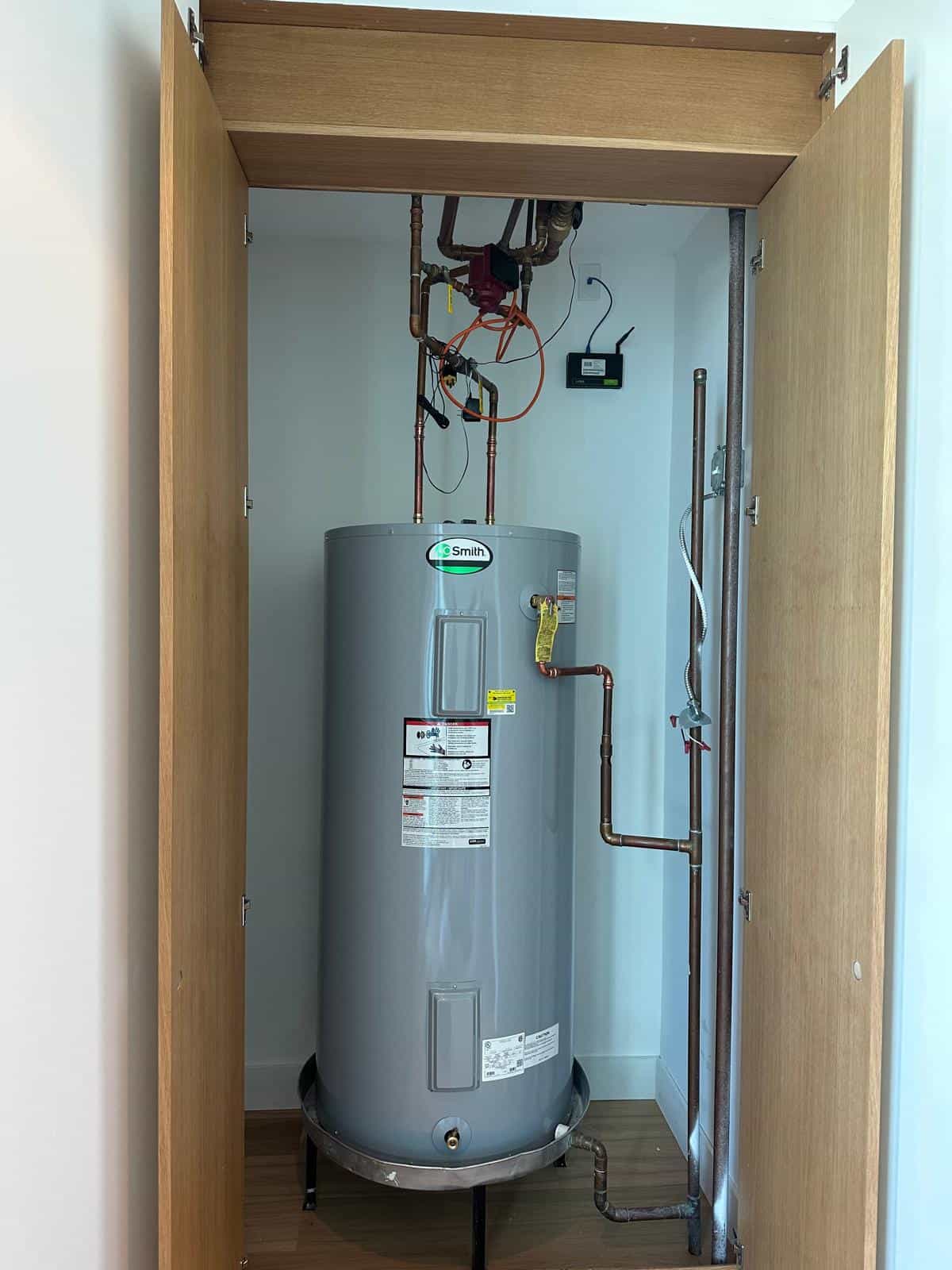 Before and after of a Water Heater by a plumber in Key Biscayne